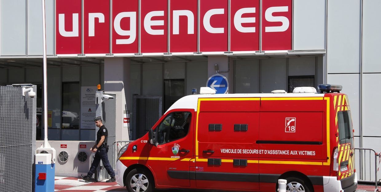An ambulance arrives outside the emergency entrance of the Pasteur 2 Hospital, days after an attack by a driver of a heavy truck in Nice